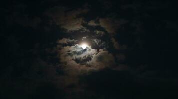 Beautiful magic blue night sky with clouds and full moon photo