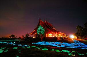 Thailand temple Phu Prao Temple or Sirindhorn Wararam,  temple with beautiful lights that glow at night in Ubon Ratchathani Province, Northeastern region Thailand. photo