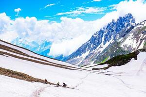 Landscape in the mountains. Panoramic view from the top of Sonmarg, Kashmir valley in the Himalayan region. meadows, alpine trees, wildflowers and snow on mountain in india. Concept travel nature. photo