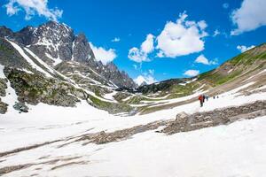 Landscape in the mountains. Panoramic view from the top of Sonmarg, Kashmir valley in the Himalayan region. meadows, alpine trees, wildflowers and snow on mountain in india. Concept travel nature. photo