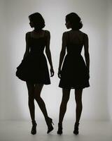 AI generated Silhouette of three women in black and white dresses, studio shot. ai generative photo