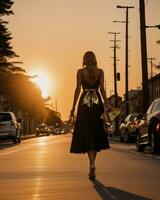AI generated Beautiful young woman in a long yellow dress walking on the street at sunset. ai generative photo