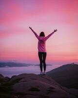 AI generated young woman hiker open arms on top of a mountain at sunrise. ai generative photo