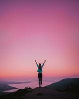 AI generated young woman hiker open arms on top of a mountain at sunrise. ai generative photo