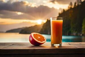 a glass of orange juice with a slice of grapefruit on a table in front of a lake. AI-Generated photo