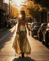 AI generated Beautiful young woman in a long yellow dress walking on the street at sunset. ai generative photo
