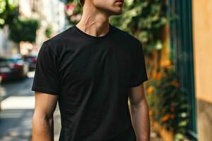 AI generated Man in blank black t-shirt standing on city street. Mockup t-shirt. photo