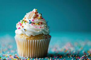 AI generated Cupcake with whipped cream and colorful sprinkles on a  blue background. photo