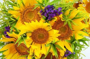 Bouquet of sunflowers and lavender isolated on white background photo