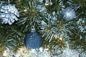 Christmas blue decoration close-up on spruce branches. Christmas and New Year holidays background. photo