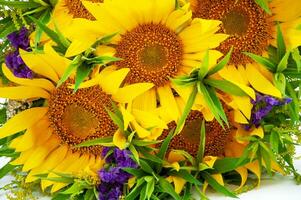 Bouquet of sunflowers and lavender isolated on white background photo