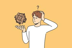 Confused man with wooden puzzle scratches head, wondering how to solve difficult problem vector