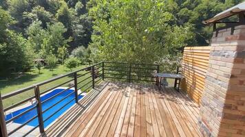 Wooden deck on the background of the river. View from above photo