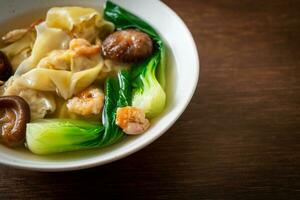 pork dumpling soup with shrimps and vegetable photo