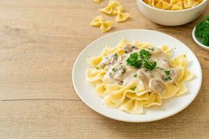 farfalle pasta with mushroom white cream sauce photo