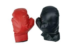 Red and black leather boxing gloves isolated on white background. photo