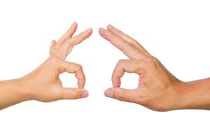 Male and female hands showing okay gesture isolated on white background. photo