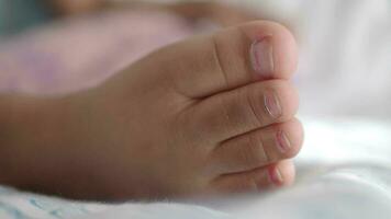 close up of dry child feet on bed , video