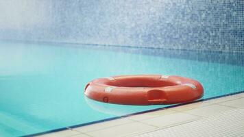 Red life buoy in swimming pool.. Help and support concept. video