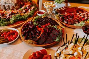 Cossack table in the best restaurants. Festive table at the wedding. National Ukrainian cuisine. Fat, sausages, alcohol. Catering. photo