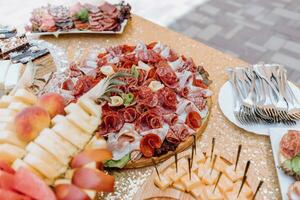 Cossack table in the best restaurants. Festive table at the wedding. National Ukrainian cuisine. Fat, sausages, alcohol. Catering. photo