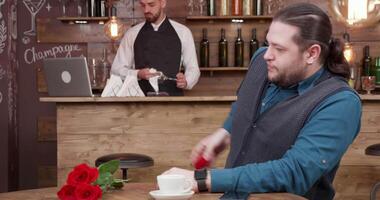 Man gets excited before a proposal to his girlfriend. Handsome man checks the diamond ring he intends to give to his future wife. video