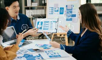 UX developer and ui designer brainstorming about mobile app interface wireframe design with customer breif and color code photo