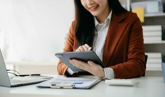 businesswoman hand working with new modern computer using on smartphone and tablet as concept photo