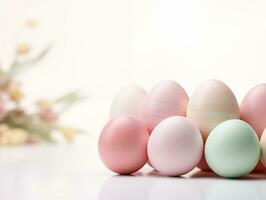 AI generated Happy easter eggs pastel color with flowers on white background, copy space for text photo