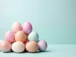 AI generated Happy easter eggs pastel color on blue background, copy space for text photo