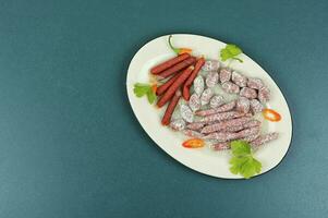Tasty salami on a plate photo