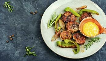 Appetizing pork medallions, space for text. photo