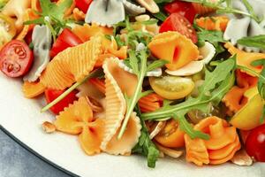 Vegetable salad with pasta, Mediterranean cuisine. photo