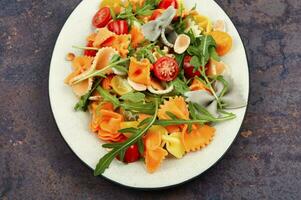 Vegetable salad with pasta. photo