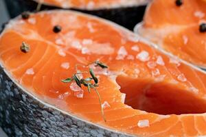 closeup of Stake Fish trout with lemon and spices photo