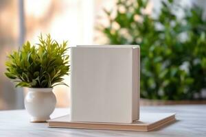 AI generated White blank book on wooden table, bright lighting, mockup, with house plant. AI Generated photo