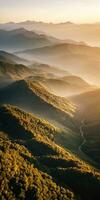 AI generated Aerial view of mountains in low clouds at sunrise in autumn. Top drone view of hills with red and orange trees in fog, colorful sky in fall. Slovenia. Nature. Mountain valley. photo