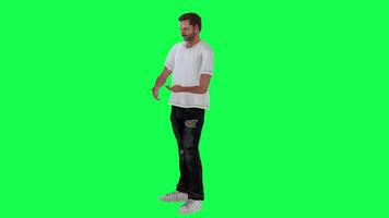 Slim criminal man in green screen with white t-shirt and black trousers, white t video