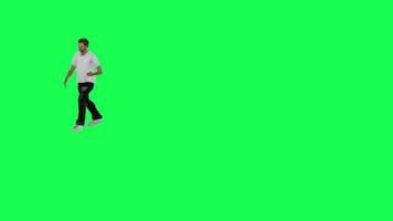 A thin male criminal in a green screen with a white t-shirt and black trousers, video