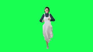 A girl with a slim figure on the green screen wearing a long navy blue stein dre video