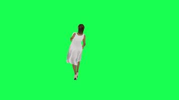 A tall woman with brown skin in a green screen with a tall white sarong and whit video
