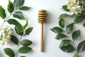 AI generated honey, honey and livia leaves on table on white background photo