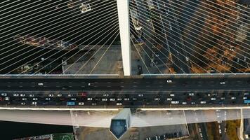 Pylon of the cable-stayed bridge from the air at dawn video