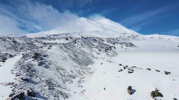 Aerial view of the northern slopes of Mount Elbrus in sunny weather video