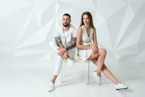 Shot of a fashionable couple posing at studio. photo