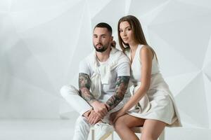 Shot of a fashionable couple posing at studio. photo