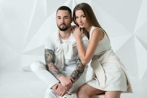 Shot of a fashionable couple posing at studio. photo