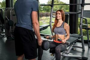 happy cutie athletic girl , execute exercise with dumb-bells photo