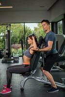 happy cutie athletic girl , execute exercise with dumb-bells photo