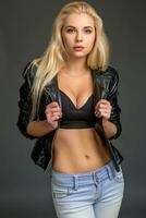 young blond woman in a black leather jacket photo